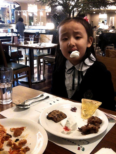 Emily lost her tooth whlie eating pizza